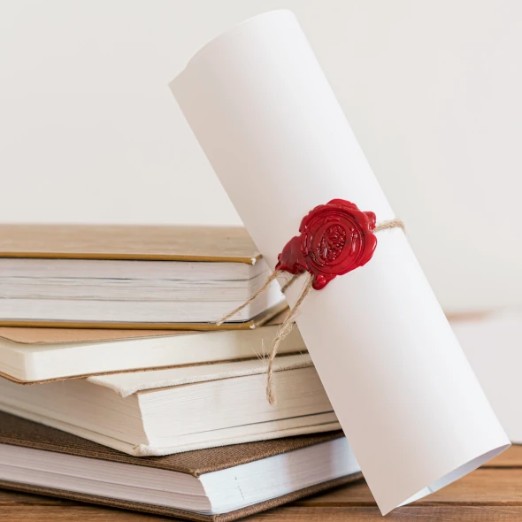 certificate-with-ribbon-bow-office-desk